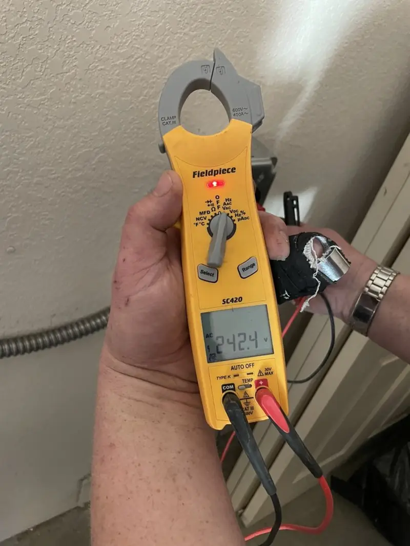 Voltage testing with clamp meter during Circuit Breaker Repair in Lake George